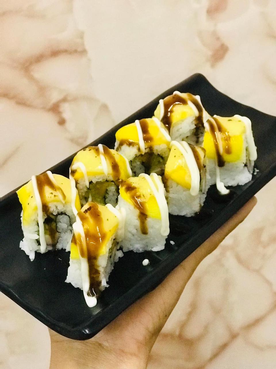 Mango-topped sushi plate at Classic Sushi Food House